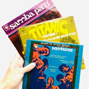 Set of 3 45RP music vintage records, Santana and Titanic, jukebox 1970’s, classic rock