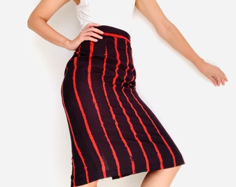 Vintage new pencil skirt in polyester, vertical stripes in red, retro 1980’s style woman outfit, retro skirt, mexican vintage