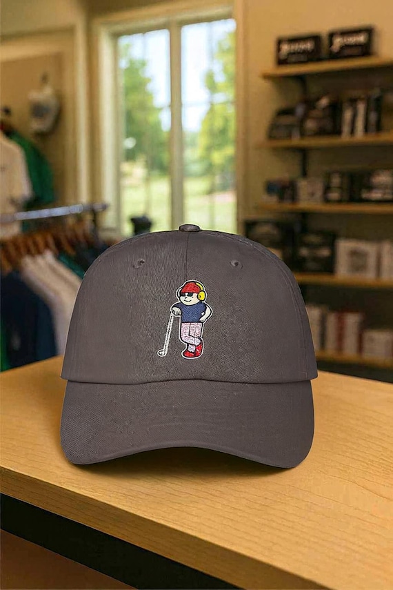 Happy Golfer Leaning on Club Cap | Golf Hat Logo, Casual Golf Apparel