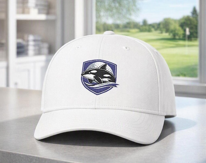 Orca Shield Embroidered Whale Crest Dad Cap | Golf Ball Moon Background