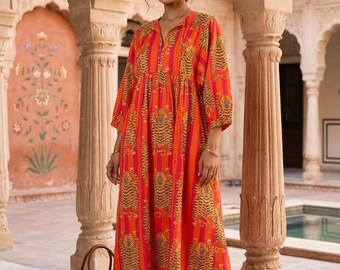 Vestido midi de algodón con estampado de tigre a rayas y bolsillos.