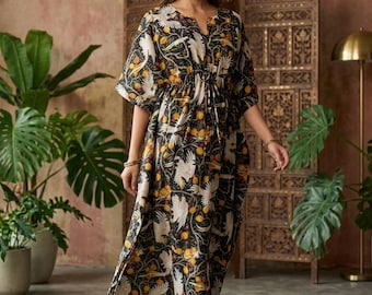 Vestido caftán de algodón orgánico con estampado floral. Vestido largo estilo boho con estampado a mano.