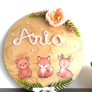 Wooden name plaque with animals Personalized wall or door decoration for baby&#39;s room - Original birth gift with flowers and knitting