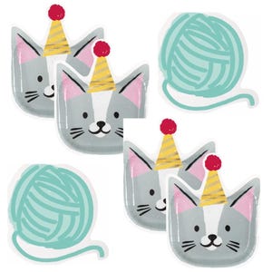 May include: A set of four paper plates shaped like gray cat faces wearing yellow and white striped party hats with red pom-poms, and two paper plates shaped like round balls of light teal yarn with a loose strand extending from the bottom.