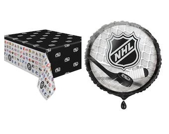 May include: A black rectangular plastic tablecloth featuring a repeating pattern of various NHL team logos and a round foil balloon displaying the NHL shield logo, a hockey stick, and a hockey puck against a white hockey net background.