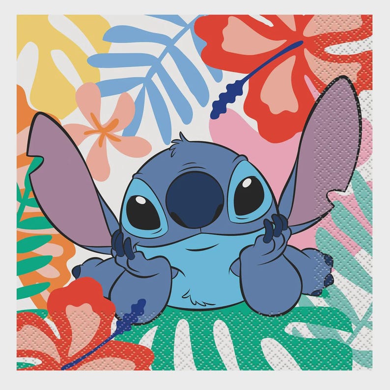 May include: A square paper napkin featuring a blue alien character with large ears resting its chin on its hands. The background displays a colorful tropical pattern with red, pink, and yellow hibiscus flowers alongside green and blue palm leaves.