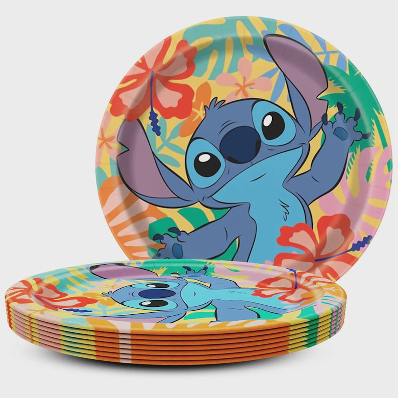 May include: A stack of round paper plates featuring a blue cartoon character with large ears and a nose, set against a vibrant yellow background decorated with red hibiscus flowers and green tropical leaves. The design is repeated on each plate.