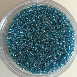 Perlina di vetro Matsuno giapponese seme 11/0 2 taglio foro rotondo argento foderato - 20 gms