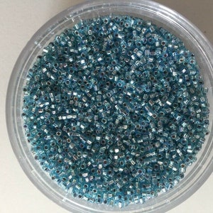 Perlina di vetro Matsuno giapponese seme 2 taglio 11/0 argento interno foderato Rainbow 77-R:SR631 - 20 gms