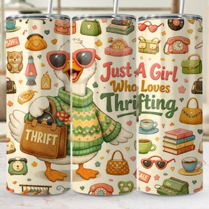 May include: A tumbler featuring a cartoon goose wearing sunglasses and a green sweater, carrying a bag labeled "THRIFT." The design includes various vintage items and the text "Just A Girl Who Loves Thrifting."