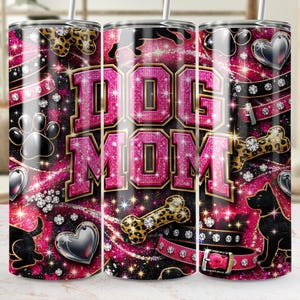 May include: A stainless steel tumbler with a pink and black design, featuring the text "DOG MOM" in a glittery font. The tumbler is decorated with paw prints, hearts, dog silhouettes, and a leopard print bone.