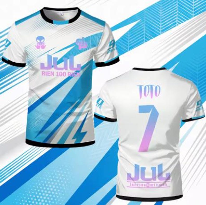 May include: A white short-sleeve t-shirt with blue graphic patterns. The front features the text JUL and RIEN 100 RIEN with an alien icon. The back displays the name TOTO, the number 7, and the text JUL and lecriseomteck in a blue and pink gradient.