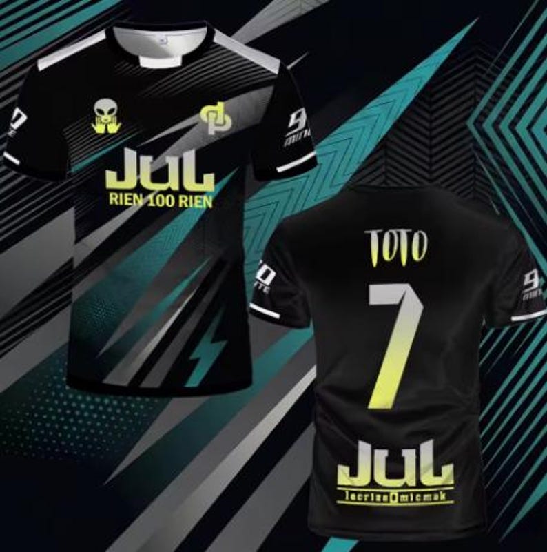 May include: A black short-sleeved t-shirt featuring teal and white graphic accents. The front displays the text JUL RIEN 100 RIEN with an alien icon. The back shows the name TOTO, the number 7, and the text JUL lecriseomicmak in yellow and white.