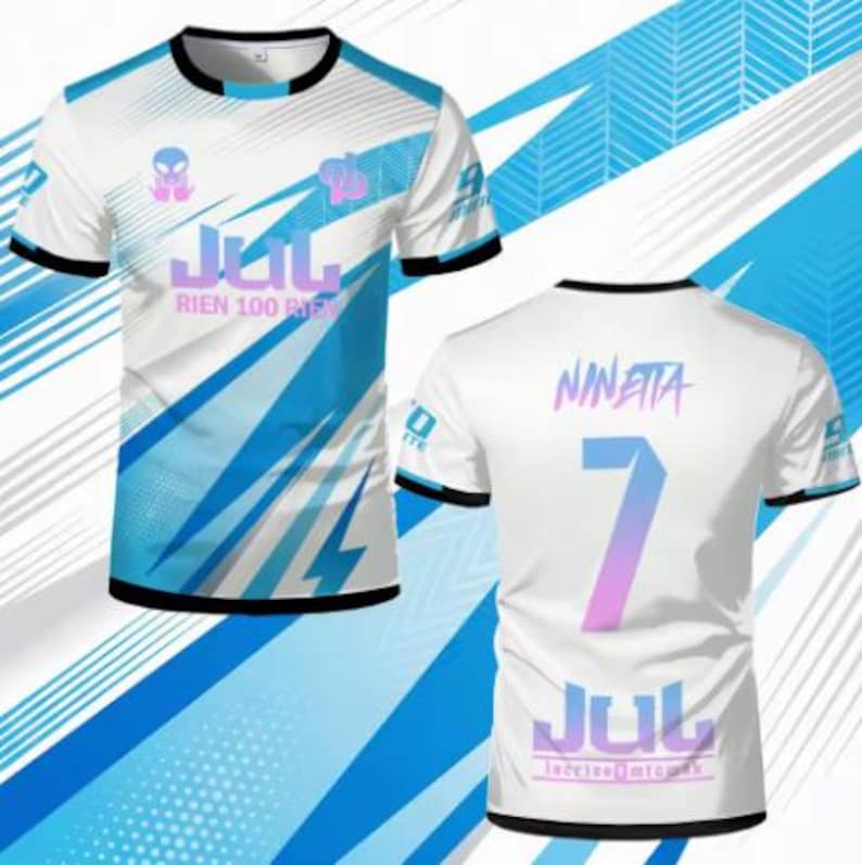 May include: A white short-sleeve t-shirt featuring blue diagonal stripes, a black crew neck, and black sleeve cuffs. The front displays the text JUL RIEN 100 RIEN with an alien graphic. The back shows the name NINETTA, the number 7, and JUL.