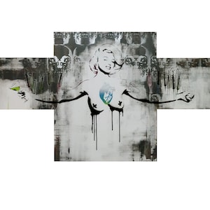May include: A black and white stencil art print of a woman with a heart on her chest. The woman is holding a martini glass in her left hand and her arms are outstretched. The background is a gray and white abstract pattern.
