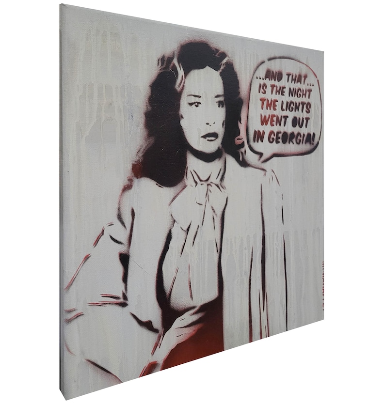 May include: A canvas wall art piece featuring a stencil-style portrait of a person with dark hair wearing a collared shirt with a bow. The image includes a speech bubble with the text: ...AND THAT... IS THE NIGHT THE LIGHTS WENT OUT IN GEORGIA!