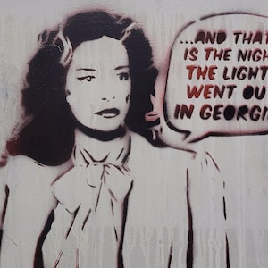 May include: A black and white stencil-style painting on canvas featuring a woman with dark hair and a pussy-bow blouse. A speech bubble to the right contains the text: ...AND THAT... IS THE NIGHT THE LIGHTS WENT OUT IN GEORGIA!