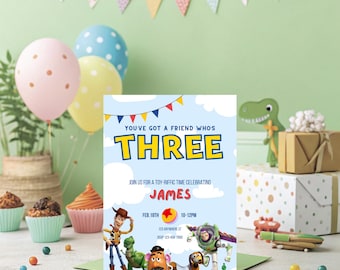 May include: A light blue birthday invitation with the text "YOU'VE GOT A FRIEND WHO'S THREE" in yellow. The invitation features Toy Story characters and party details. Balloons and cupcakes are in the background.