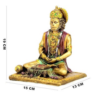 May include: A gold-colored Hanuman statue, seated with hands in a meditative pose. The statue is adorned with a jeweled crown and layered necklaces. The base measures 15 cm x 13 cm, and the statue is 19 cm tall.