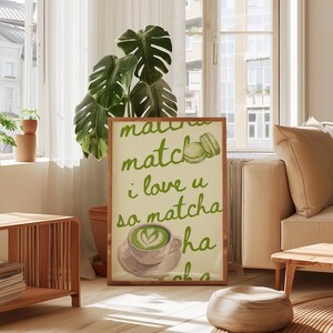 May include: A framed print with a light green background and the words "matcha, match, i love u so matcha" in green script. The print also features a matcha latte and a macaron.