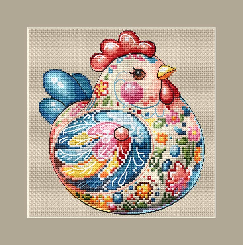 May include: A colorful cross-stitch design of a chicken. The chicken features a red comb and wattle, blue wings, and a body adorned with floral patterns in pink, yellow, and blue. The background is a neutral beige.