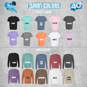 May include: A display of t-shirts in various colors, including black, blue, and white, with the text "T-SHIRT COLORS" and "YOUTH T-SHIRT" at the top. The image also shows long-sleeve shirts in different colors.
