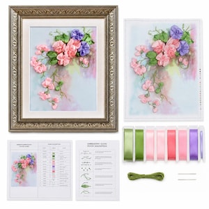 May include: A ribbon embroidery kit featuring a floral design with pink and purple flowers on a watercolor background. Includes a framed finished piece, an unframed fabric panel, spools of colored ribbon, green thread, and two needles.