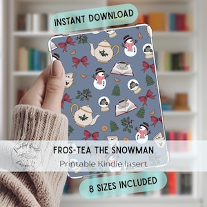 May include: A Kindle insert with a blue background featuring a pattern of snowmen, teapots, books, and bows. The text "FROS-TEA THE SNOWMAN" and "Printable Kindle Insert" are displayed. The words "INSTANT DOWNLOAD" and "8 SIZES INCLUDED" are also visible.