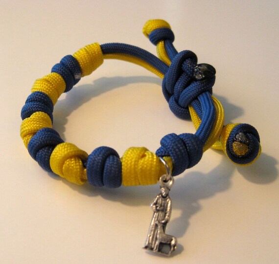 Items similar to St. Francis of Assisi adjustable prayer bead paracord