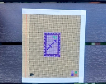 Lienzo bordado con sello del zodiaco