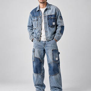 May include: A light blue and medium blue patchwork denim jacket and matching wide-leg cargo jeans. The jacket features a collar, button front, and chest pockets. The jeans have large side cargo pockets and a white t-shirt is worn underneath.