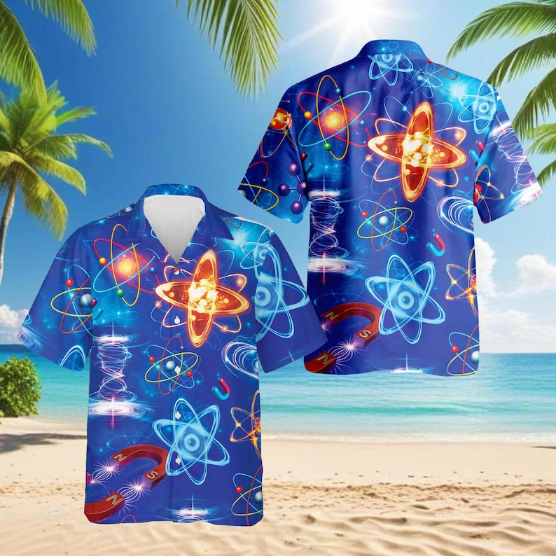 May include: Blue short-sleeved shirt with a science-themed design. The shirt has a repeating pattern of atom diagrams, magnets, and glowing orbs. The background shows a beach scene with palm trees and the sea.