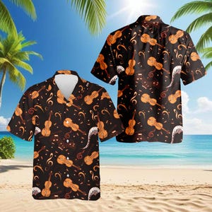 May include: Black button-down shirt with a repeating pattern of orange violins, musical notes, and piano keys. The short-sleeved shirt is displayed on a beach with palm trees and a blue sky in the background. The shirt has a classic collar and a relaxed fit.