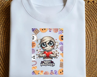 Cute Halloween Mummy Holding Heart PNG Design (Digital Download)
