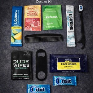 May include: A deluxe kit containing various personal care items. Includes electrolyte drink mix, vitamin C packets, deodorant wipes, a comb, mouthwash, a toothbrush, Dude Wipes, a bottle opener, face wipes, and Orbit gum. The kit contains 11 items.