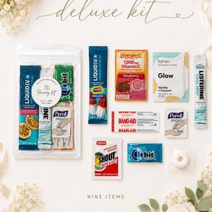 May include: A deluxe kit containing nine items: a Liquid I.V. passion fruit sachet, a Liquid I.V. firecracker sachet, an Emergen-C raspberry sachet, a Fomin Glow vanilla coconut wipe, a Listerine cool mint strip, two Purell wipes, a Band-Aid, a Shout wipe, and an Orbit gum pack, all arranged with a recovery kit label.
