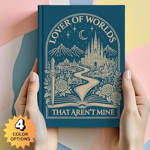 May include: A dark teal hardback book featuring gold line art of a castle, a sword, roses, and a winding path. The text reads LOVER OF WORLDS THAT AREN'T MINE. A starburst graphic in the corner indicates 4 COLOUR OPTIONS are available for this item.