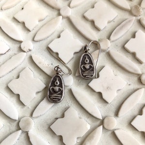 dangle pure silver buddha earrings