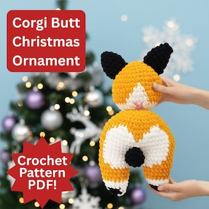 May include: A handmade, crochet corgi butt Christmas ornament. The ornament is yellow, white, and black, with the text "Corgi Butt Christmas Ornament" and "Crochet Pattern PDF!" on the image. The ornament is held in front of a Christmas tree.
