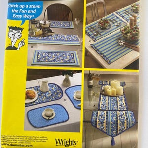 May include: A sewing pattern for table runners and placemats. The pattern includes four different designs, all featuring a blue and yellow floral pattern. The pattern is from Wrights and includes instructions for stitching up a storm the fun and easy way.