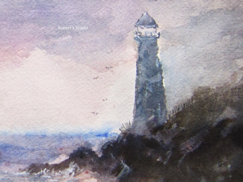 May include: A watercolor painting of a lighthouse on a rocky cliff with a cloudy sky and sea in the background. The lighthouse is gray and has a white roof. The sky is a soft purple and pink. The sea is a light blue. The painting is signed "Robert's Studio" in the upper left corner.