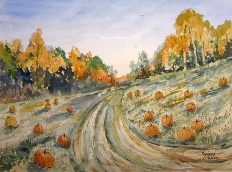 May include: A watercolor painting of a dirt road winding through a field of pumpkins. The pumpkins are scattered across the field, with some in the foreground and others in the background. The trees on the hillside are a mix of green and yellow, suggesting autumn. The sky is a light blue with a few white clouds.