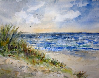 May include: Watercolor painting of a seascape with a sandy beach, blue water, and a cloudy sky. The painting features a grassy dune in the foreground and a few birds flying in the sky.