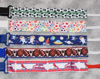 Nuk clips/pacifier clips/binki clip/soothie/infant pacifier clips S3 Soccer Space Astronaut Sports St Louis Cardinals