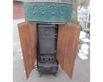 Cast Iron Stove With Tin Surround # 180047 Shipping is not a 1.00 Shipping is not free please contact us before purchase Thanks