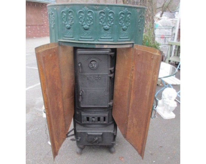 Cast Iron Stove With Tin Surround # 180047 Shipping is not free please conatct us before purchase Thanks