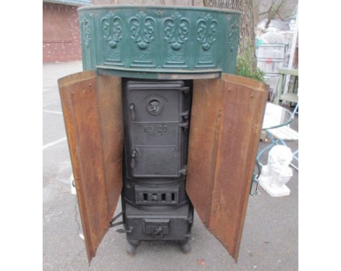 Cast Iron Stove With Tin Surround # 180047 Shipping is not a 1.00 Shipping is not free please contact us before purchase Thanks