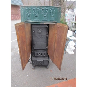 Cast Iron Stove With Tin Surround # 180047 Shipping is not a 1.00 Shipping is not free please contact us before purchase Thanks