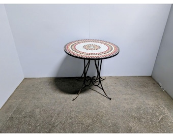 1950, Tile Top Table On An Iron Base # 199704 Shipping is not a 1.00 Shipping is not free please contact us before purchase Thanks