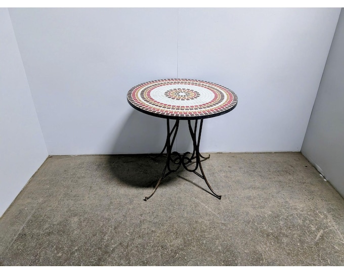 1950, Tile Top Table On An Iron Base # 199704 Shipping is not a 1.00 Shipping is not free please contact us before purchase Thanks